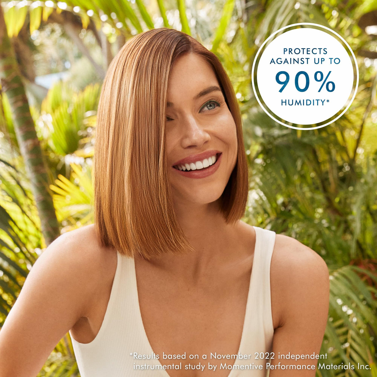 Moroccanoil Frizz Shield Styling Spray with hair styling tools