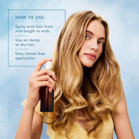 Moroccanoil Hair Oil Mist 3.4 Fl. Oz. with argan oil background
