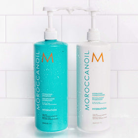 Moroccanoil Hydrating Shampoo on a bathroom shelf