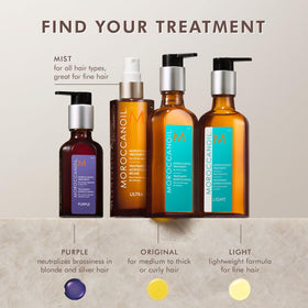 Moroccanoil Light 25ml bottle with hair styling tools