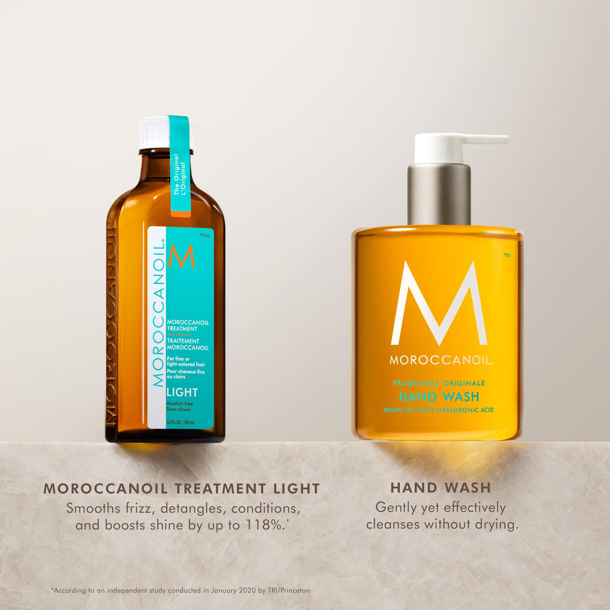 Moroccanoil Light Hair Oil and Hand Wash on a bathroom counter