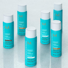 Moroccanoil Luminous Hairspray Extra Strong 75ml in hand