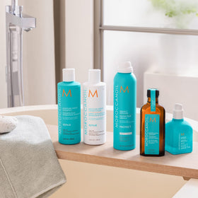 Moroccanoil Moisture Repair Shampoo with floral elements