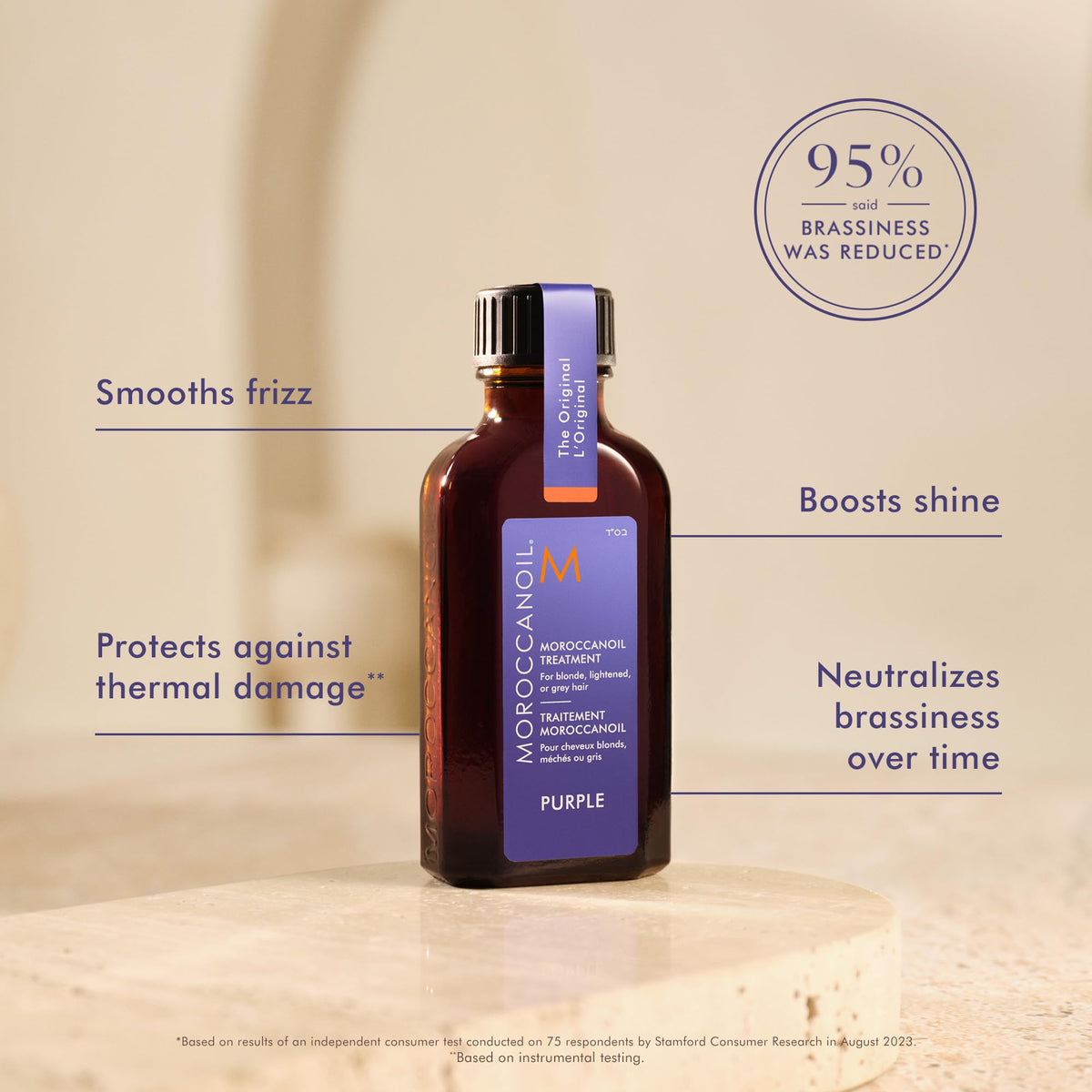 Moroccanoil Purple Hair Oil on a bathroom counter