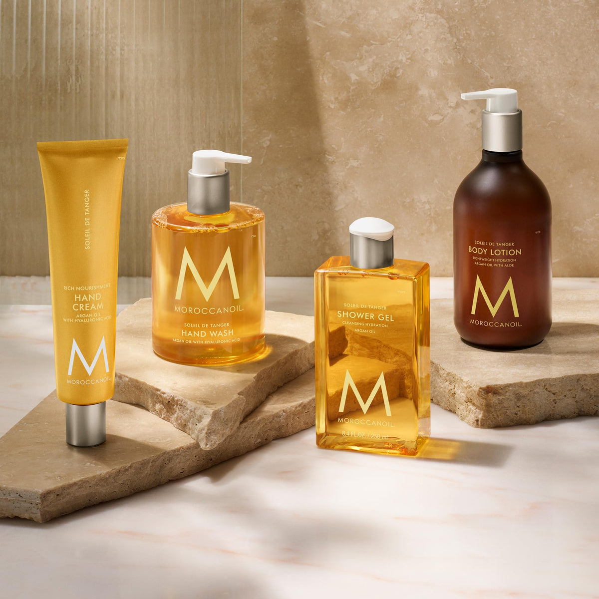 Moroccanoil Shower Gel Soleil De Tanger on a bathroom shelf
