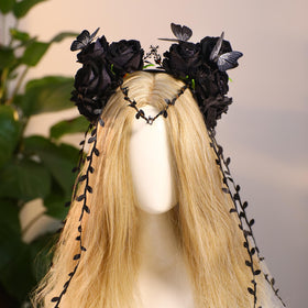 MOSTORY Black Flower Crown Headband displayed on a rustic background