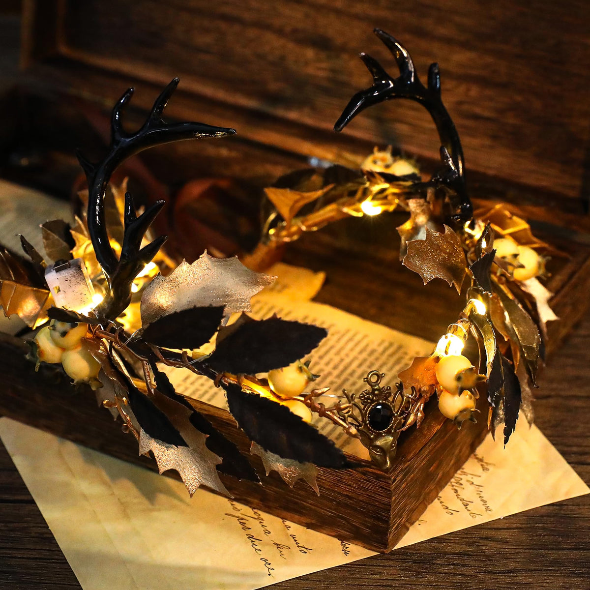 MOSTORY Light Up Antler Crown displayed on a decorative background