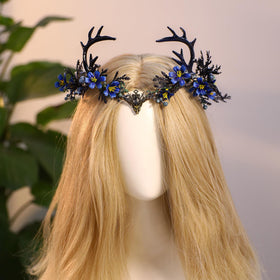MOSTORY Light Up Antler Crown displayed on a model