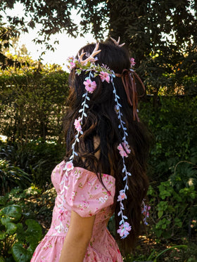 MOSTORY Pink Fairy Antler Headpiece worn at a Renaissance fair