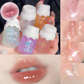 Mrettick Shimmer Lip Gloss Set in hand for size reference