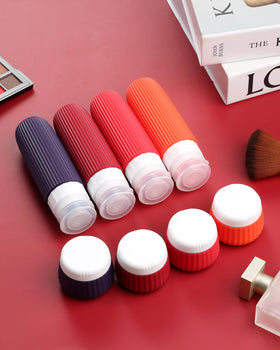 Mrsdry travel bottles arranged with toiletries