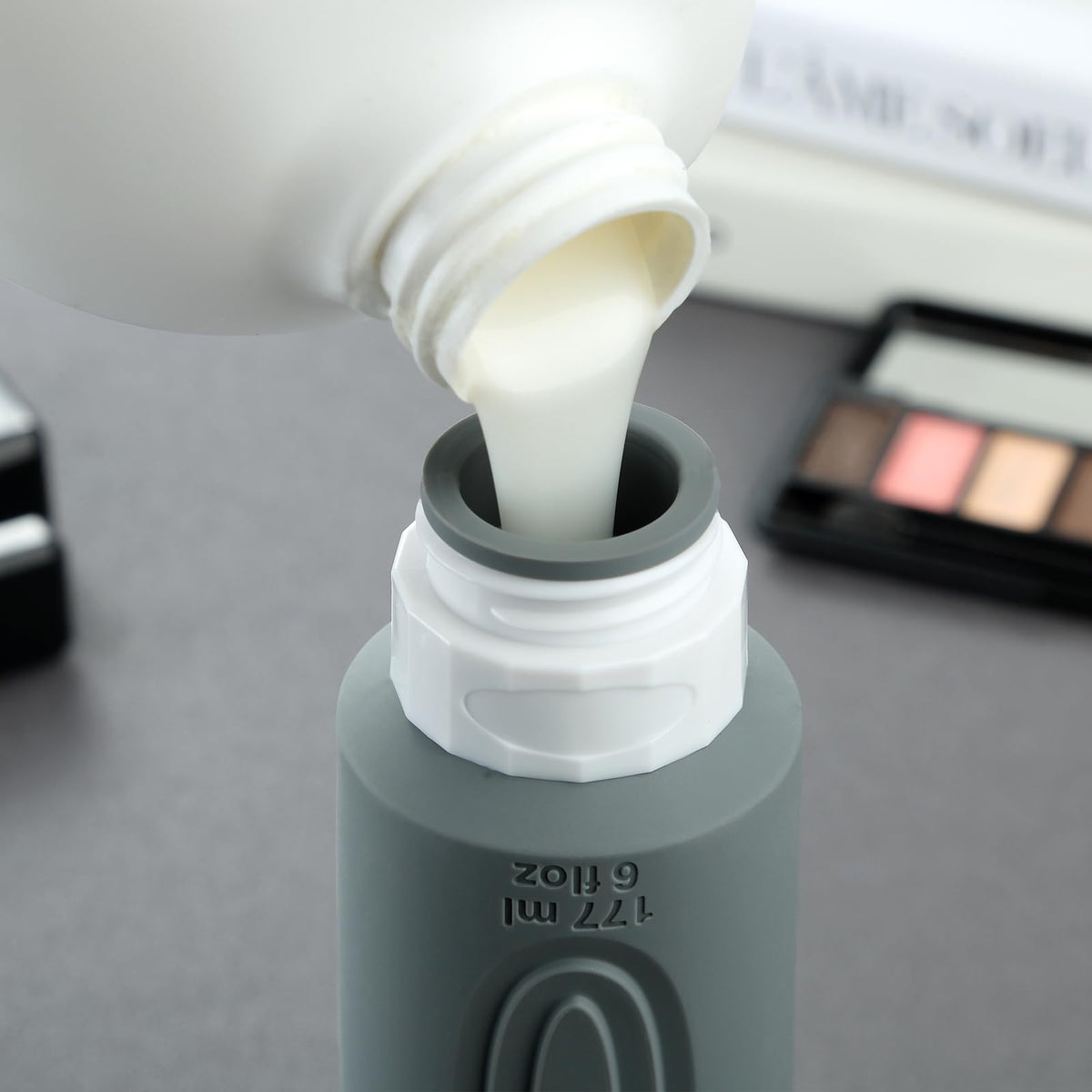 Mrsdry Travel Bottles being filled with shampoo