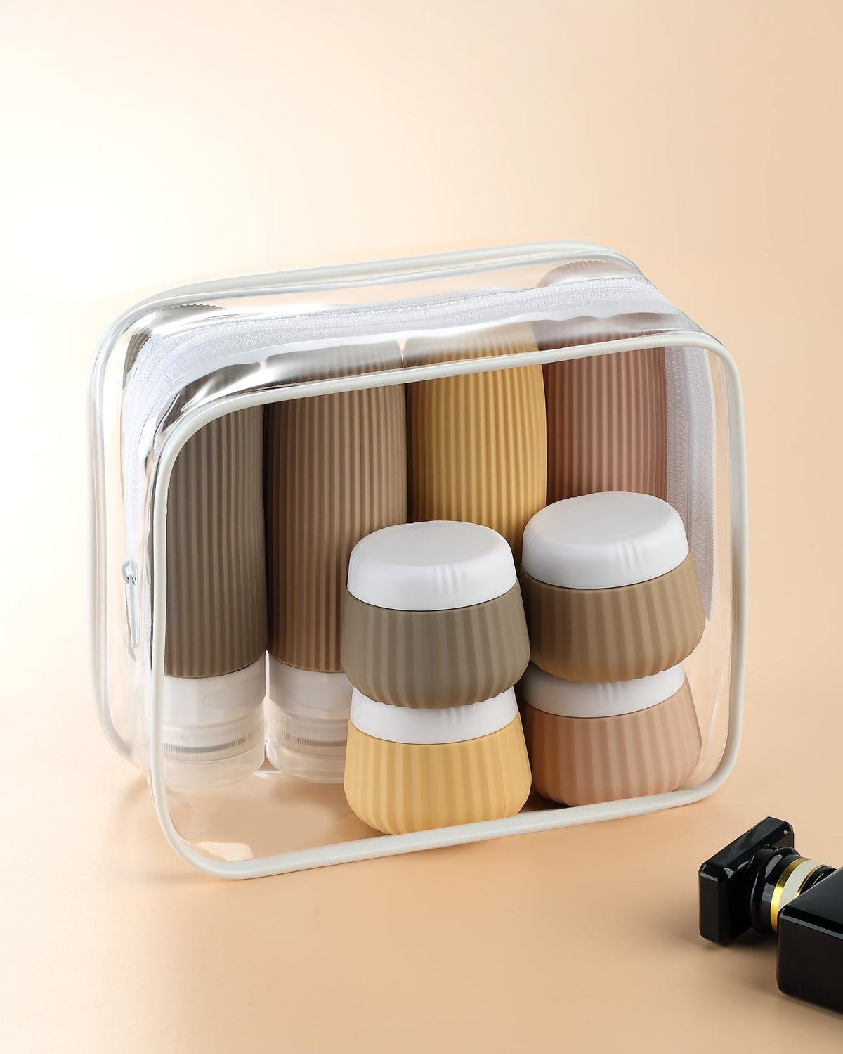 Mrsdry travel bottles packed in a clear makeup bag