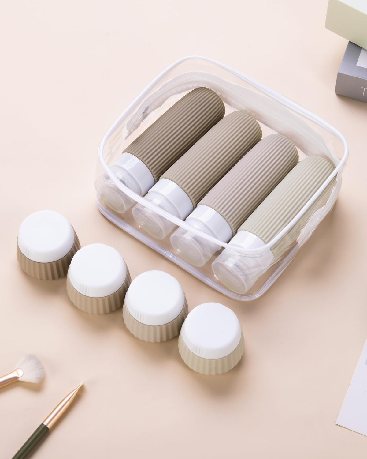 Mrsdry travel bottles with toiletries in a travel setting