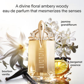 Mugler Alien Goddess bottle with floral background