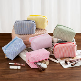 Multiple UUYUUY makeup bags arranged for gifting
