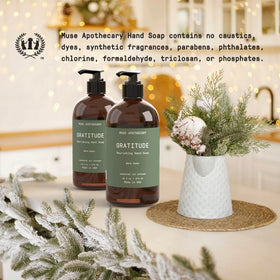 Muse Apothecary Hand Ritual Warm Cedar bottle with lather