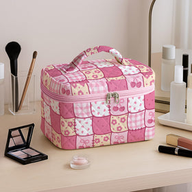 MYSMOR Large Quilted Makeup Bag in a travel setting with accessories