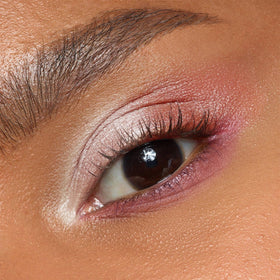 MYSTER ROSEY Mini Eyeshadow Palette lifestyle shot with makeup accessories