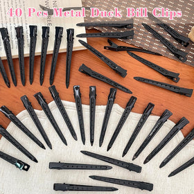 Mythos duck billed clips on a vanity table