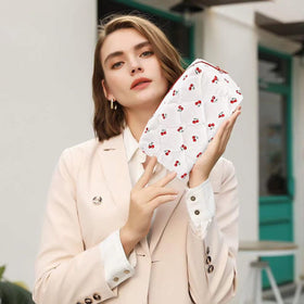 MZLUWM Floral Makeup Bag displayed on a vanity