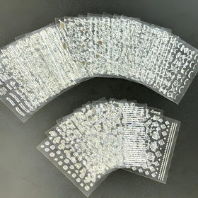 Nail art design using SPLOCUDU silver self-adhesive stickers