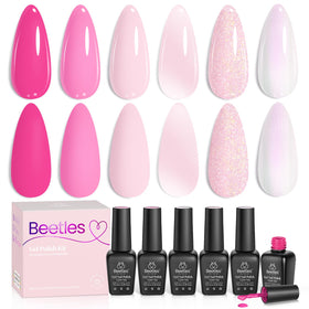 nails painted with beetles pink gel polish in various shades