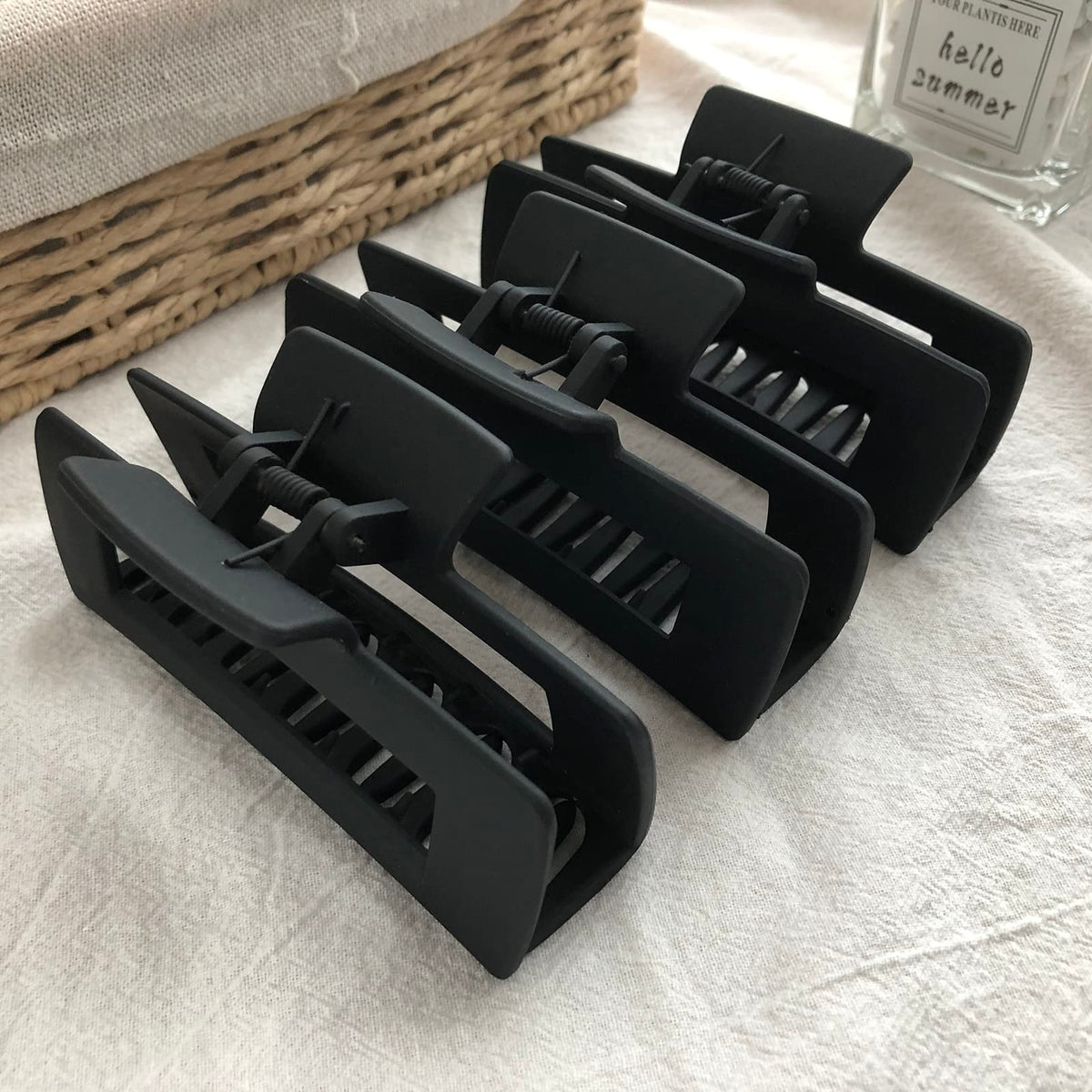 Nalodu Hair Claw Clips 3 pack displayed on a vanity