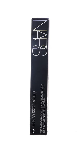 NARS Radiant Creamy Concealer Sucre D'orge on makeup vanity