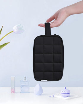 Narwey Quilted Makeup Bag black on travel setup
