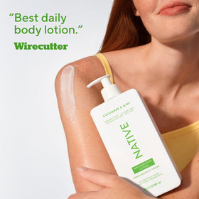 Native Body Lotion 16.5 fl oz with a fresh cucumber slice