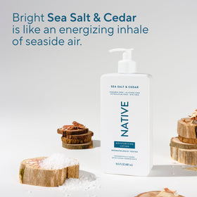 Native Body Lotion Sea Salt & Cedar bottle on a bathroom counter