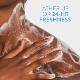 Native Body Wash 18 oz held in hands with a fresh background