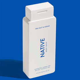 Native Body Wash Sea Salt & Cedar on a bathroom shelf