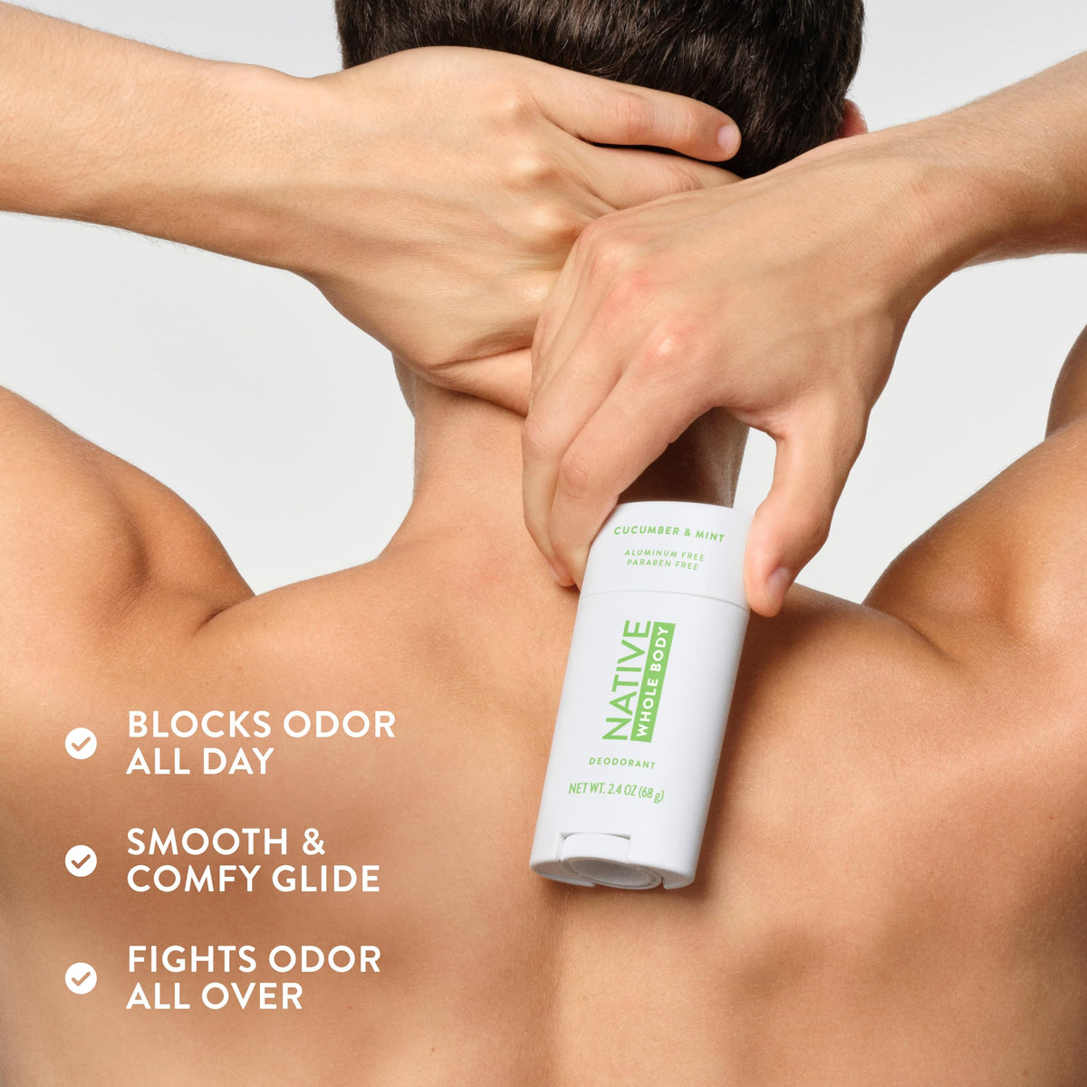 Native deodorant stick against a fresh cucumber