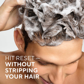 Native Full & Thick 2-in-1 Shampoo & Conditioner in a bathroom setting