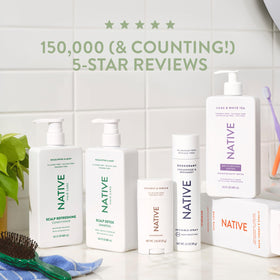Native Moisturizing Hand & Body Lotion on a vanity