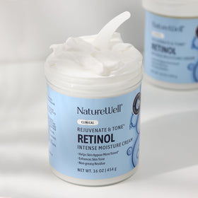 NATURE WELL Retinol cream surrounded by flowers