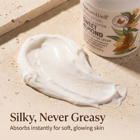 NATURE WELL Sweet Almond Body Cream on a bathroom counter