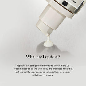 Naturium Multi-Peptide Advanced Serum on a bathroom counter