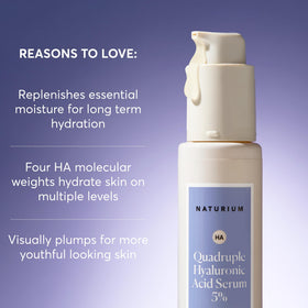 Naturium Quadruple Hyaluronic Acid Serum 5% on a marble surface
