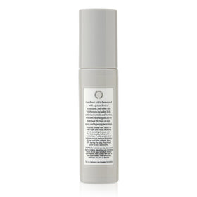 Naturium Tranexamic Acid Serum 5% showing texture on hand