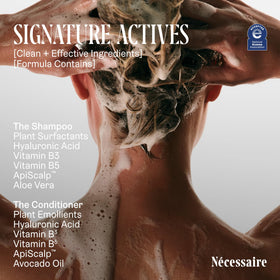 Nécessaire Hair Duo Shampoo and Conditioner set on bathroom shelf