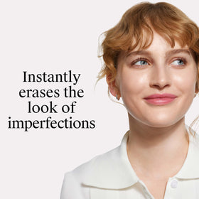 Neutrogena Anti-Aging Perfector Tinted Facial Moisturizer on a vanity