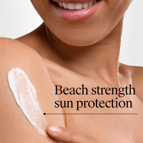 Neutrogena Beach Defense Sunscreen Lotion SPF 30 with beach background
