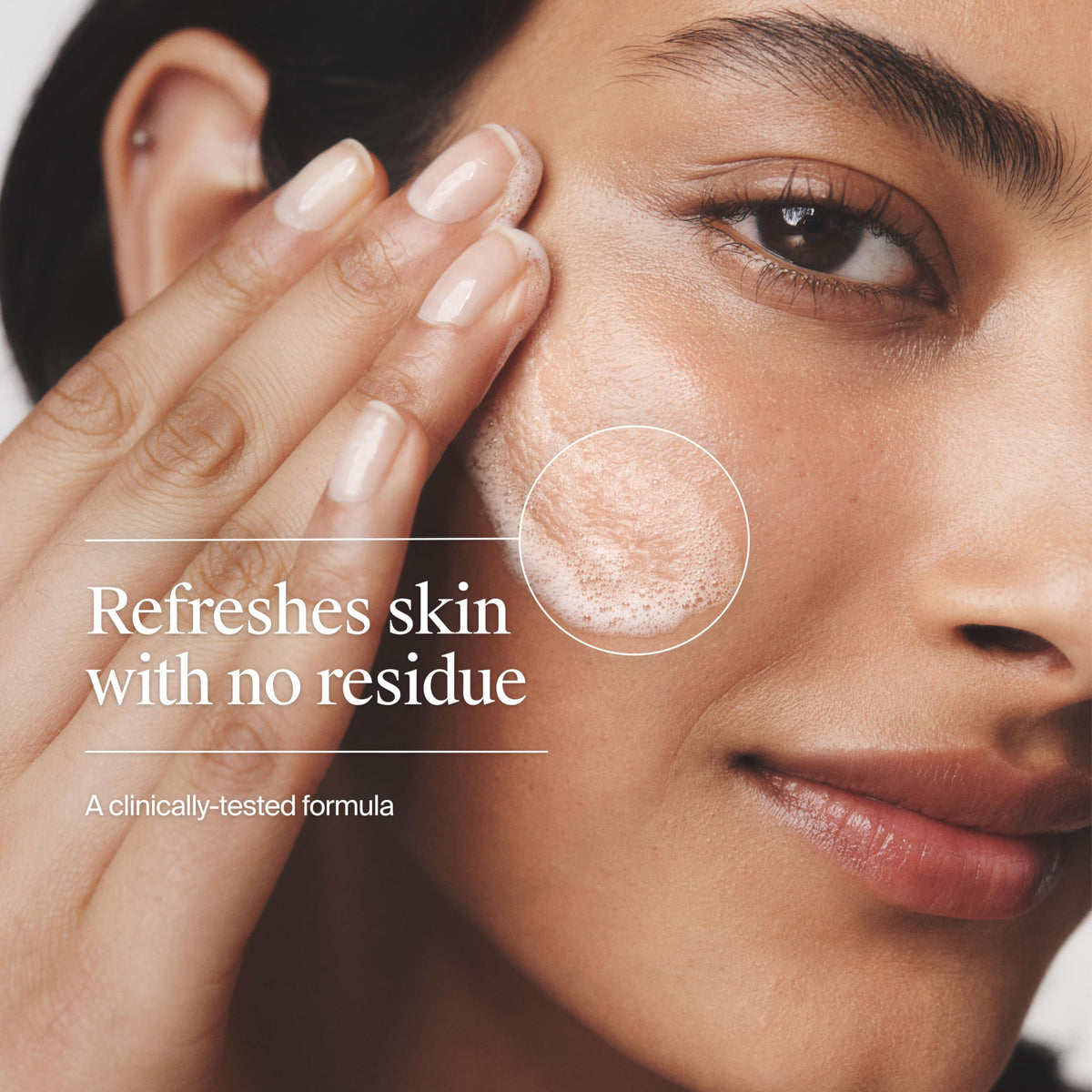 Neutrogena Fresh Foaming Facial Cleanser with foamy lather on hand