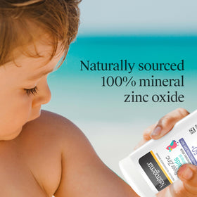 Neutrogena Kids Sunscreen Stick being applied to a child's face