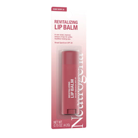 Neutrogena Revitalizing Tinted Lip Balm beside a beach scene