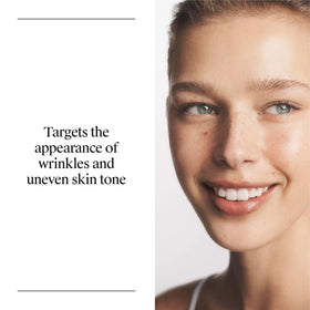 Neutrogena Triple Age Repair Face Moisturizer with cream texture on a hand