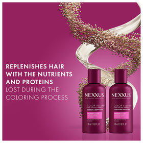 Nexxus Color Assure Shampoo bottle with a soft lather in a hand